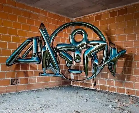 Уличный художник создает объемные граффити, стирающие грань между нарисованным и реальным