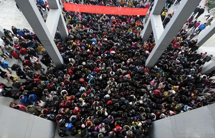 Жизнь в движении: 15 удивительных снимков, подчёркивающих особенности многолюдной Китайской повседневности