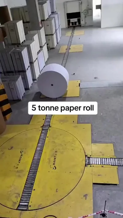 Внутри фабрики: перемещение 5-тонного рулона бумаги