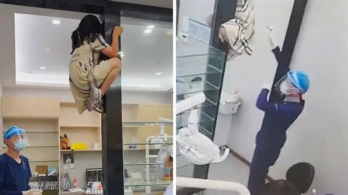 Девушка забралась на дверной косяк у стоматолога