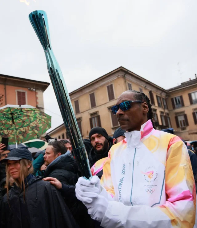 Снуп Догг зажигает Олимпиаду: рэпер несет огонь в своем стиле!